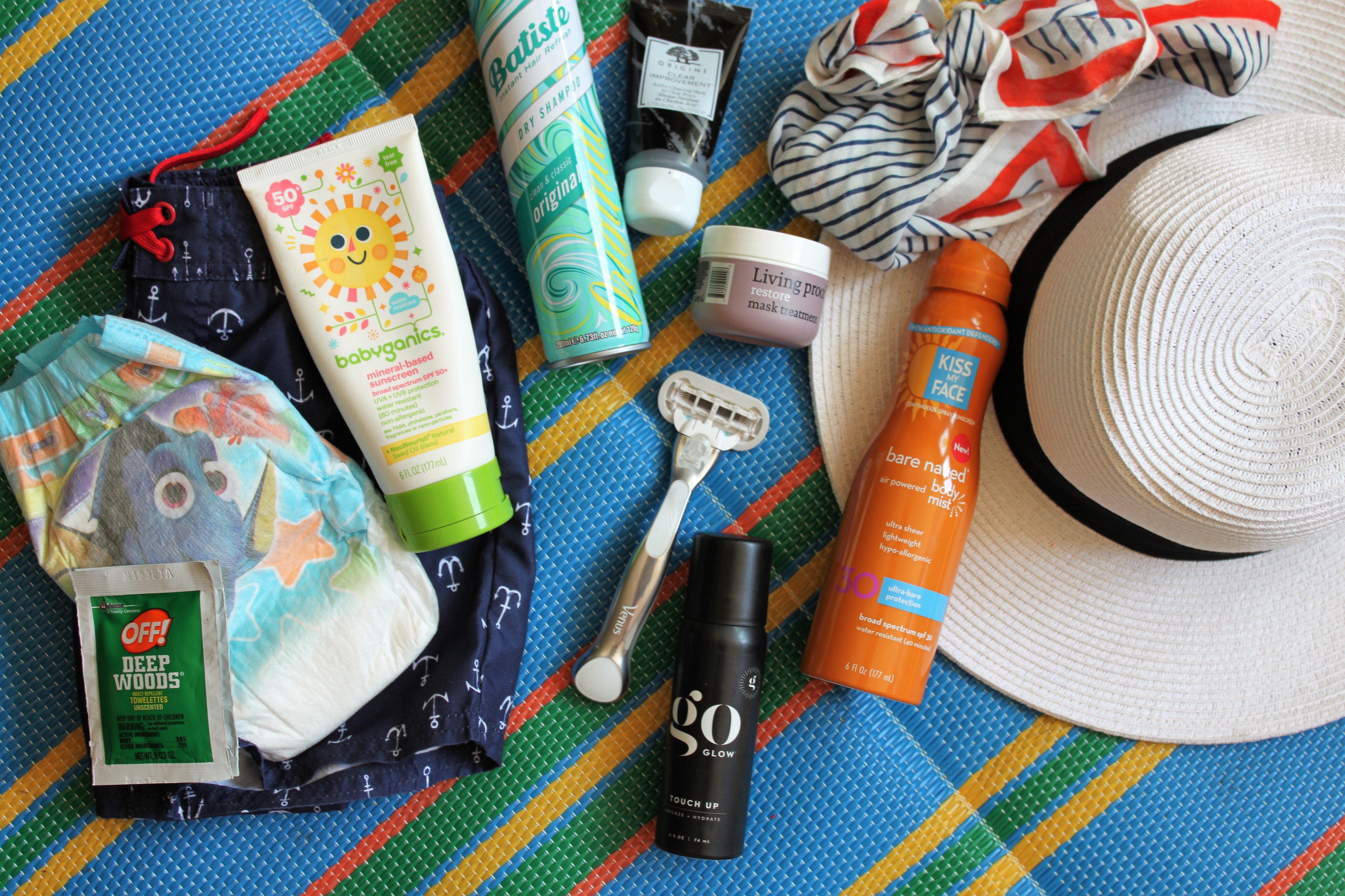 summer essentials for mom and toddler for parks, beach, and pool. Sunscreen, skin and hair products