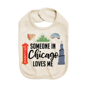 Natural Color Baby Bib with text, "Some in Chicago loves me." There are images of classic Chicago icons like the Bean, pizza, and the Chicago Theater sign.